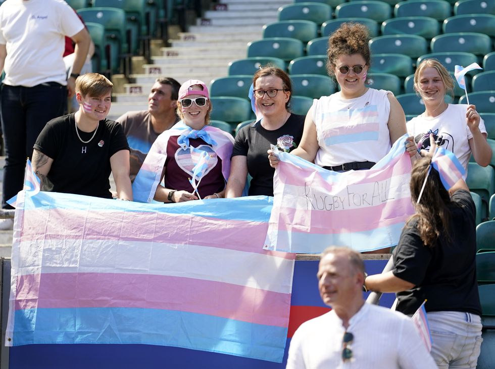 England fans with Transgender Pride flags in the stands after an open training session at Twickenham Stadium, London. Picture date: Thursday August 11, 2022.