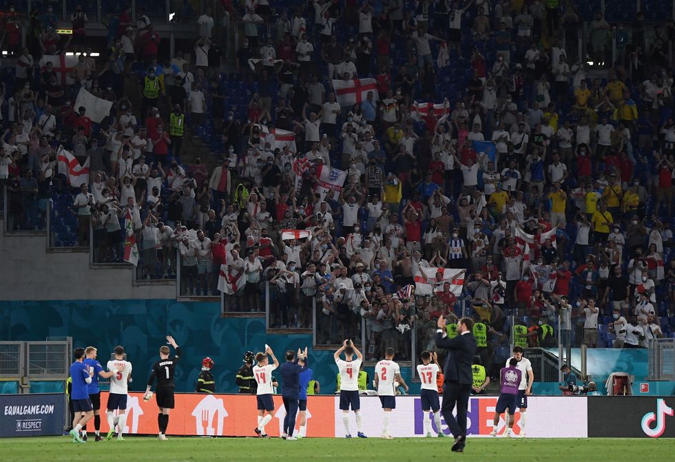 England manager Gareth Southgate and players celebrate after the match