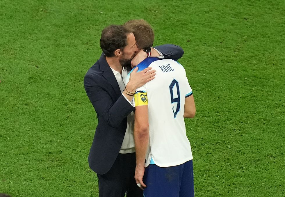 England manager Gareth Southgate consoles Harry Kane following the FIFA World Cup Quarter-Final match at the Al Bayt Stadium in Al Khor, Qatar. Picture date: Saturday December 10, 2022.