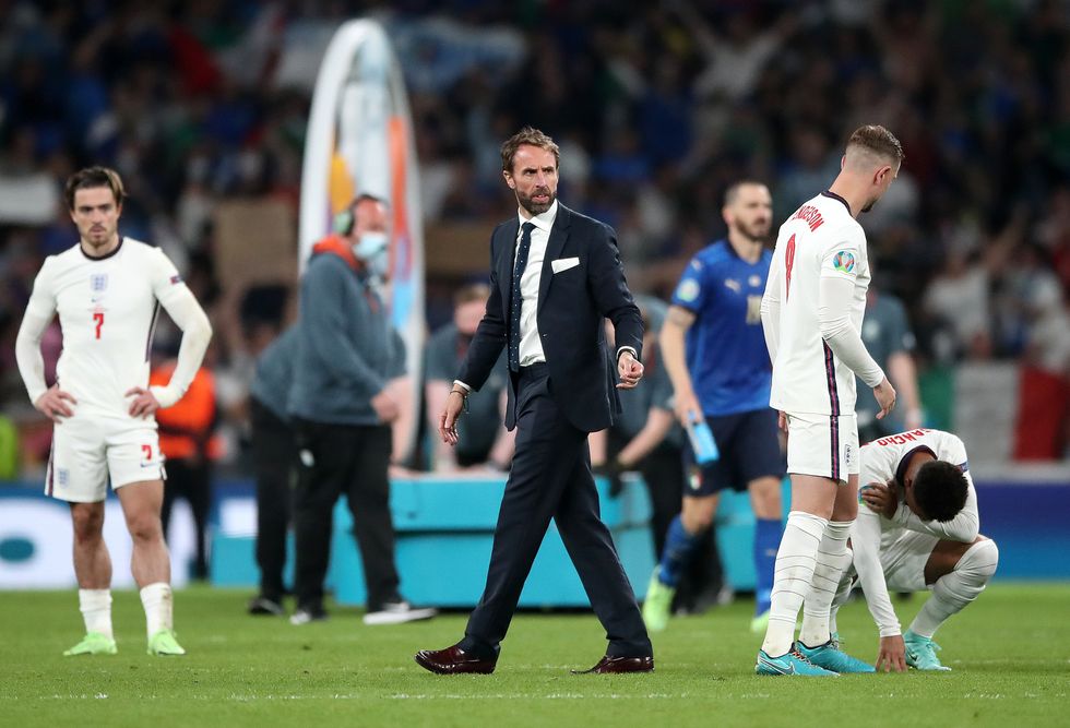 England manager Gareth Southgate with his players following defeat in the penalty shoot-out after the UEFA Euro 2020 Final at Wembley.
