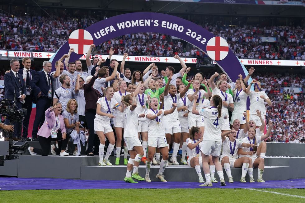 England players celebrate with the trophy following victory over Germany in the UEFA Women's Euro 2022 final at Wembley Stadium, London. Picture date: Sunday July 31, 2022.