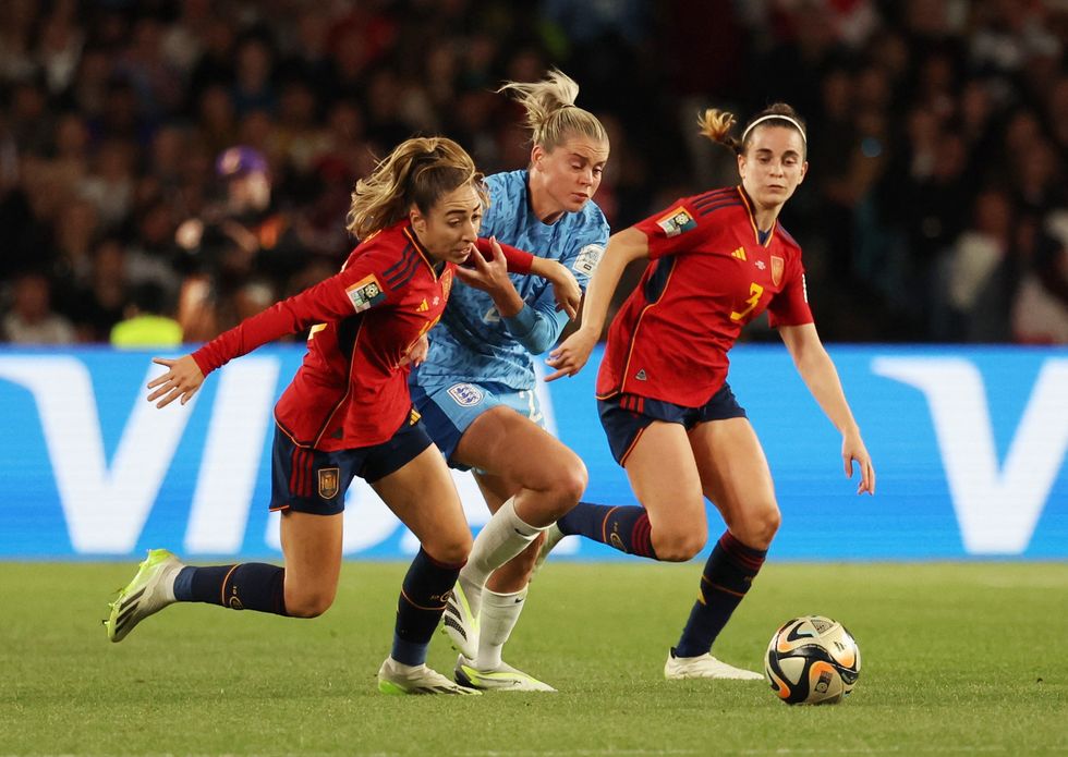 England's Alessia Russo in action with Spain's Teresa Abelleira and Olga Carmona