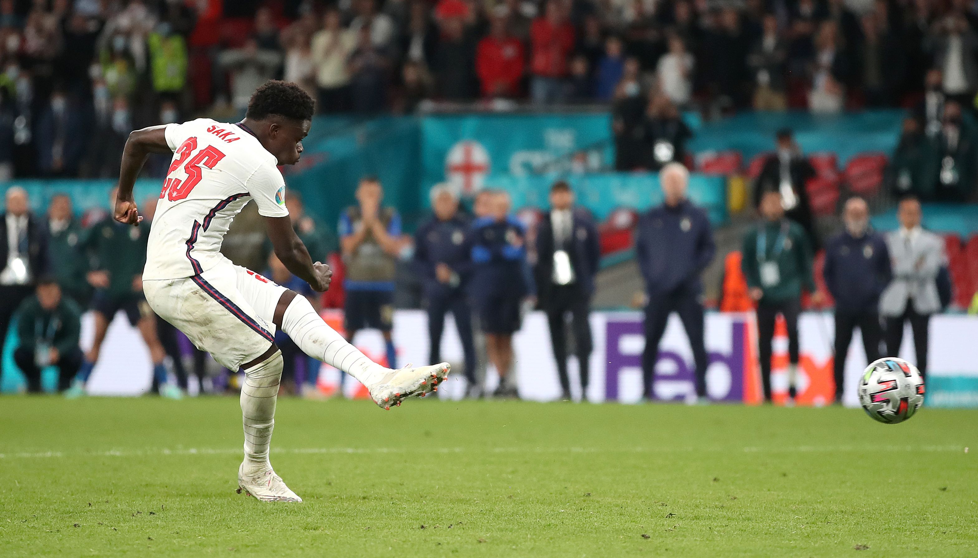 England's Bukayo Saka has his shot saved in the penalty shoot-out during the UEFA Euro 2020 Final at Wembley Stadium, London.