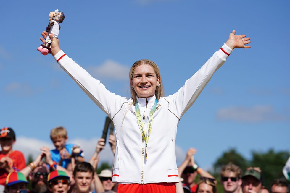 England's Evie Richards celebrates on the podium with her gold in the Women's Cross-country final at Cannock Chase on day six of the 2022 Commonwealth Games. Picture date: Wednesday August 3, 2022.