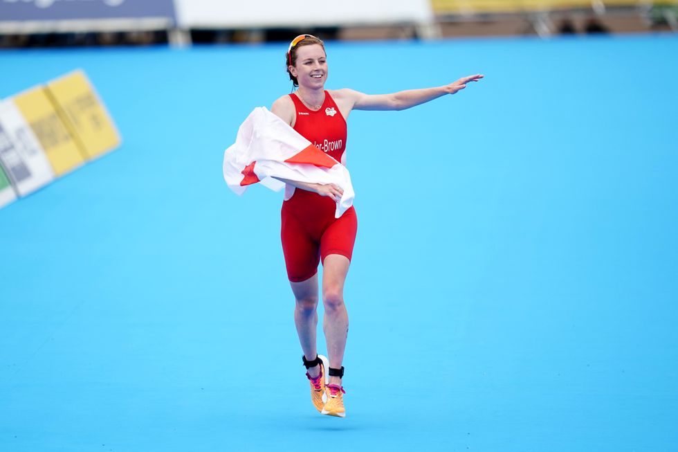 England's Georgia Taylor Brown celebrates crossing the line in second during the Womens Individual (Sprint Distance) Final at Sutton Park on day one of the 2022 Commonwealth Games in Birmingham. Picture date: Friday July 29, 2022.
