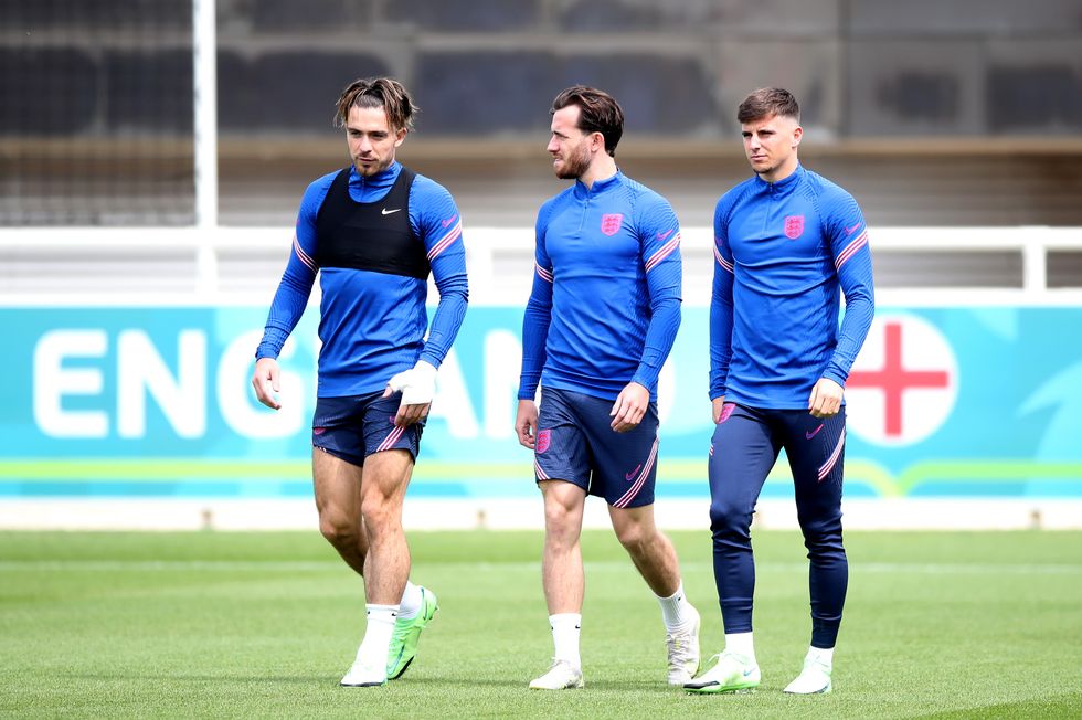 England's Jack Grealish, Ben Chilwell and Mason Mount during a training session at St George's Park, Burton upon Trent. Picture date: Saturday July 10, 2021.