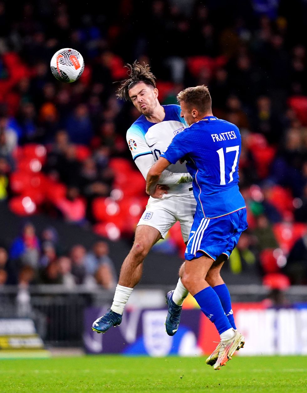 England's Jack Grealish (left) and Italy's Davide Frattesi battle for the ball during the UEFA Euro 2024 qualifying match at Wembley Stadium