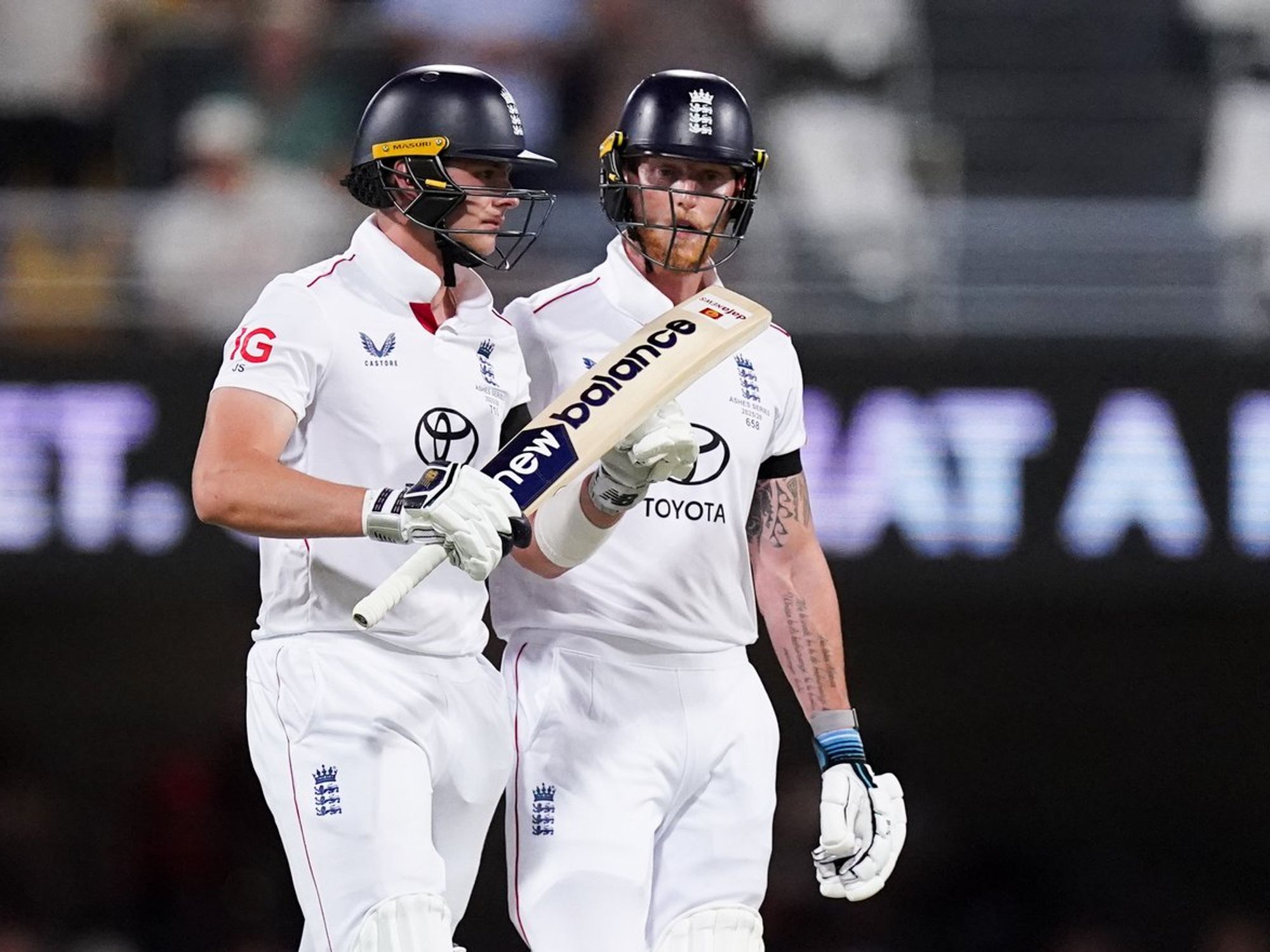 England's Jamie Smith with Ben Stoke