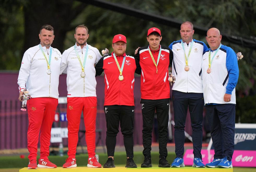 England's Jamie Walker and Sam Tolchard with their Silver medals, Wales' Daniel Salmon and Jarrad Breen with their Gold medals and Scotland's Paul Foster and Alex Marshall with their Bronze medal won in the Lawn Bowls Men's Pairs at Victoria Park on day five of the 2022 Commonwealth Games in Birmingham. Picture date: Tuesday August 2, 2022.
