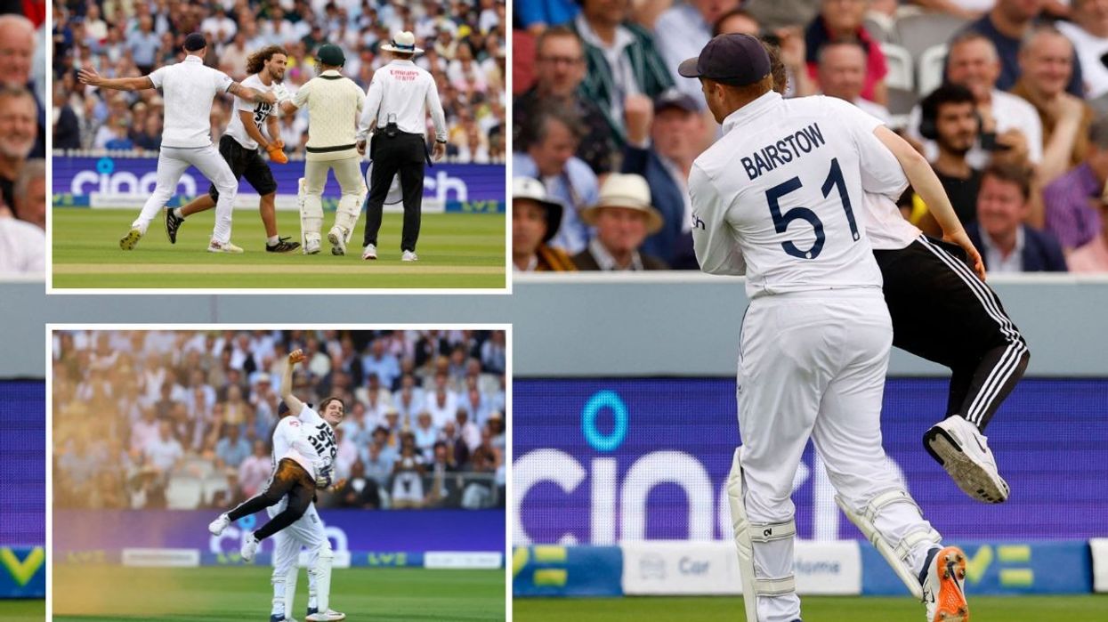 England's Jonny Bairstow carries a just stop oil protester off the field