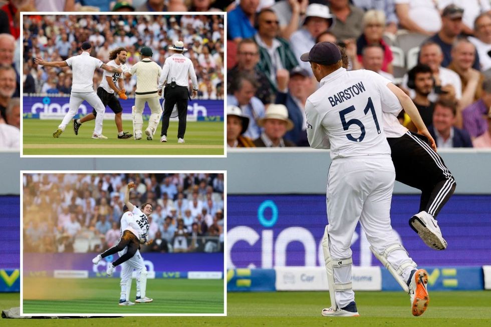 England's Jonny Bairstow carries a just stop oil protester off the field
