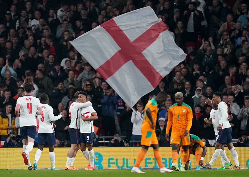 England's Ollie Watkins (fourth left) celebrates scoring their side's first goal of the game during the international friendly match at Wembley Stadium, London. Picture date: Tuesday March 29, 2022.