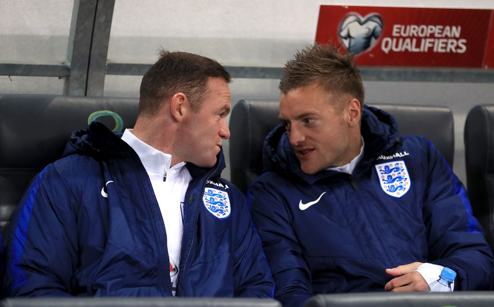 England's Wayne Rooney (left) and Jamie Vardy (right) in the dugout during the 2018 FIFA World Cup Qualifying match at the Stozice Stadium, Ljubljana.
