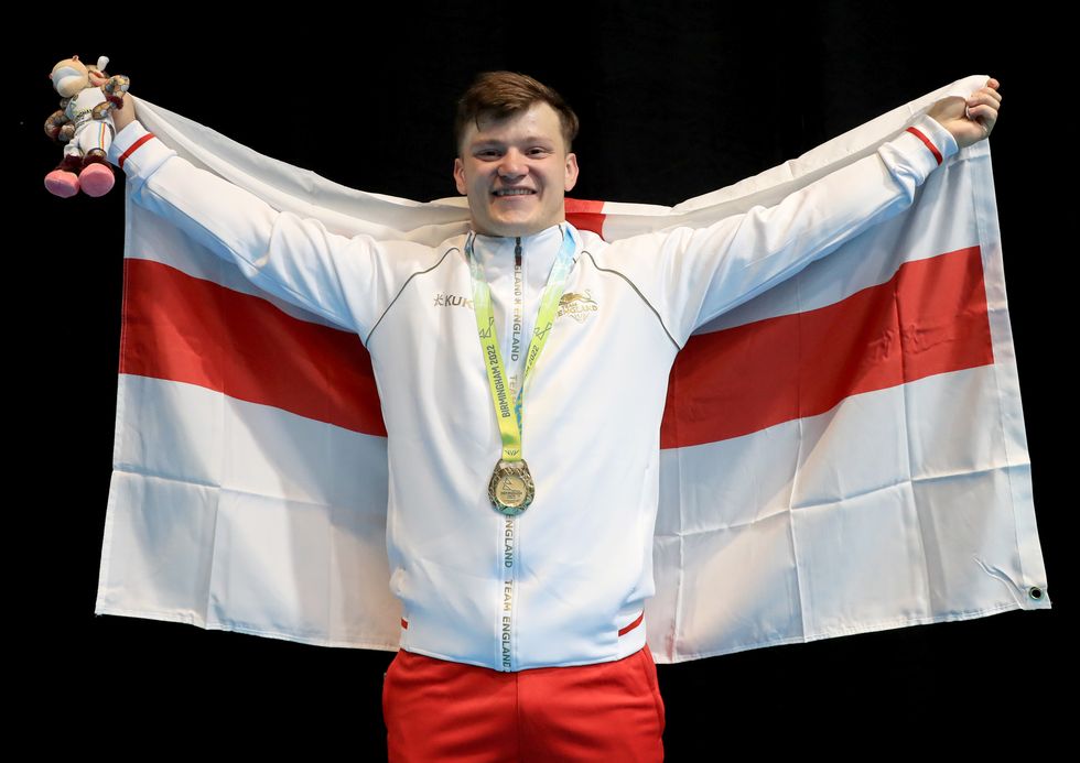 Englands Chris Murray celebrates after winning a Gold Medal during the Mens 81kg Weightlifting Competition at The NEC on day four of the 2022 Commonwealth Games in Birmingham