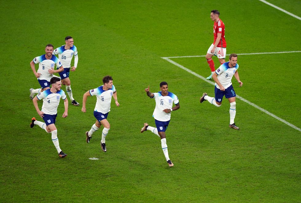 England's Marcus Rashford celebrates scoring the opening goal during the FIFA World Cup Group B match at the Ahmad Bin Ali Stadium, Al Rayyan, Qatar. Picture date: Tuesday November 29, 2022.