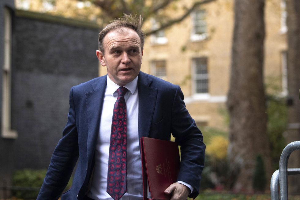 Environment Secretary George Eustice arrives in Downing Street.