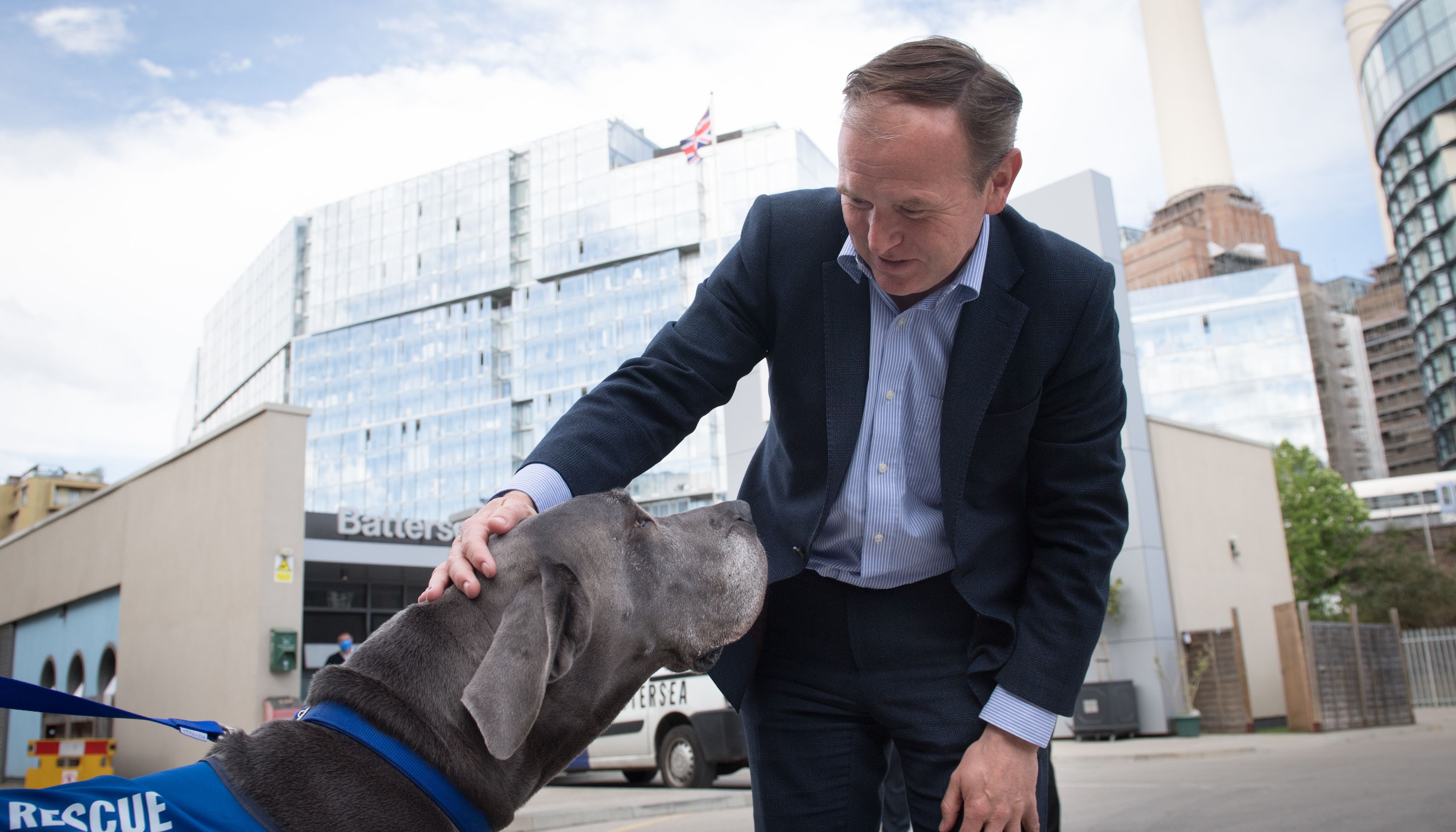 Environment Secretary George Eustice during a visit to Battersea Dogs and Cats Home in London.