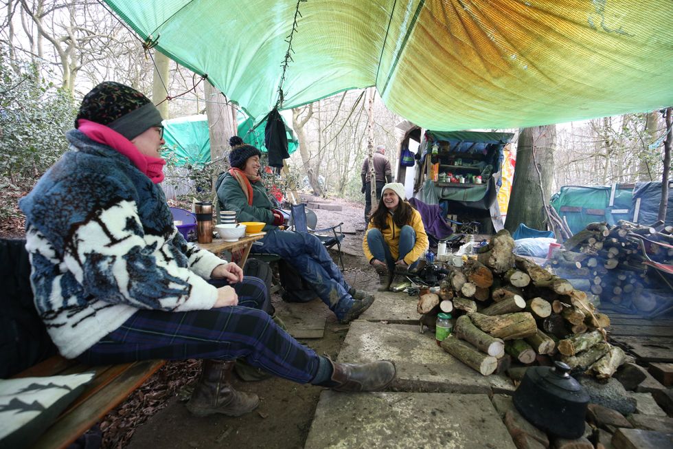 Environmental activists camped in protest in Jones' Hill Wood, near Aylesbury Vale in Buckinghamshire, one of the woodlands which is due to be affected by the building of HS2. Picture date: Friday March 12, 2021. PA Photo. Nearly half of the wood, said to have inspired Roald Dahl to write Fantastic Mr Fox, will be dug up for the construction of HS2. Photo credit should read: Jonathan Brady/PA Wire