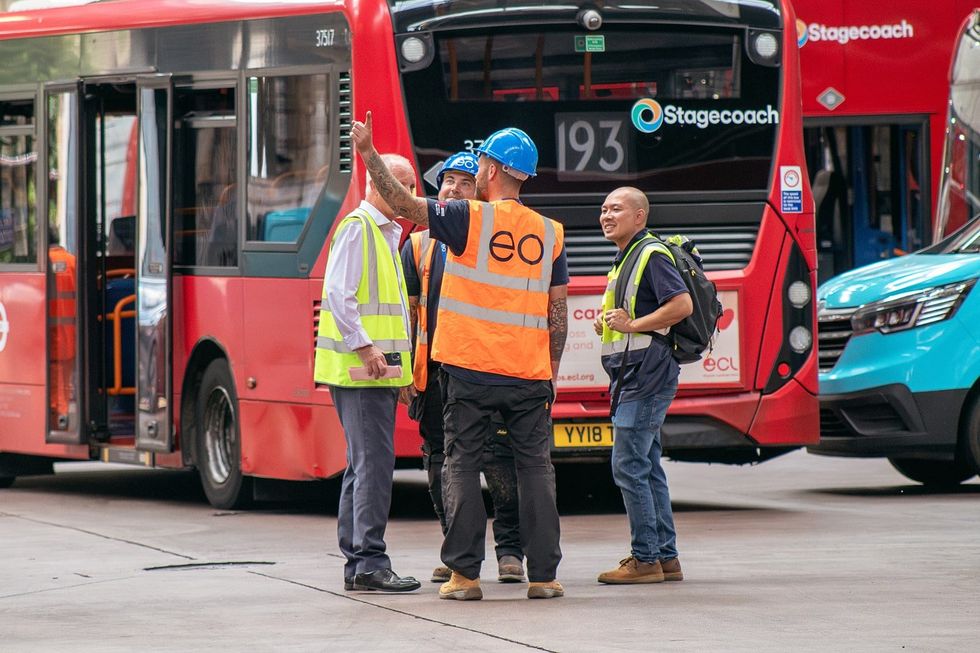 EO Charging workers at a Stagecoach depot