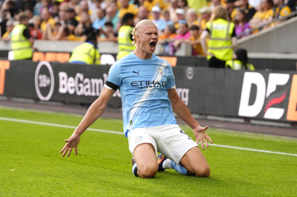 Erling Haaland scored twice in a 3-0 win over Wolves at Molineux