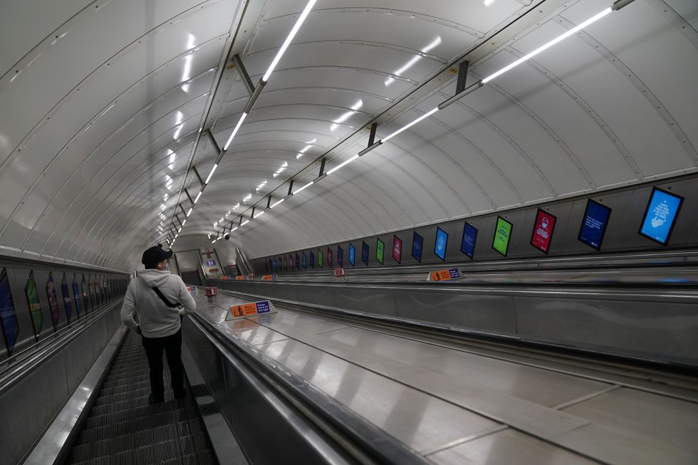 Escalators at Leicester Square London Underground station in central London, at 08:05hrs the morning after the England football team lost the UEFA Euro 2021 final. Picture date: Monday July 12, 2021.