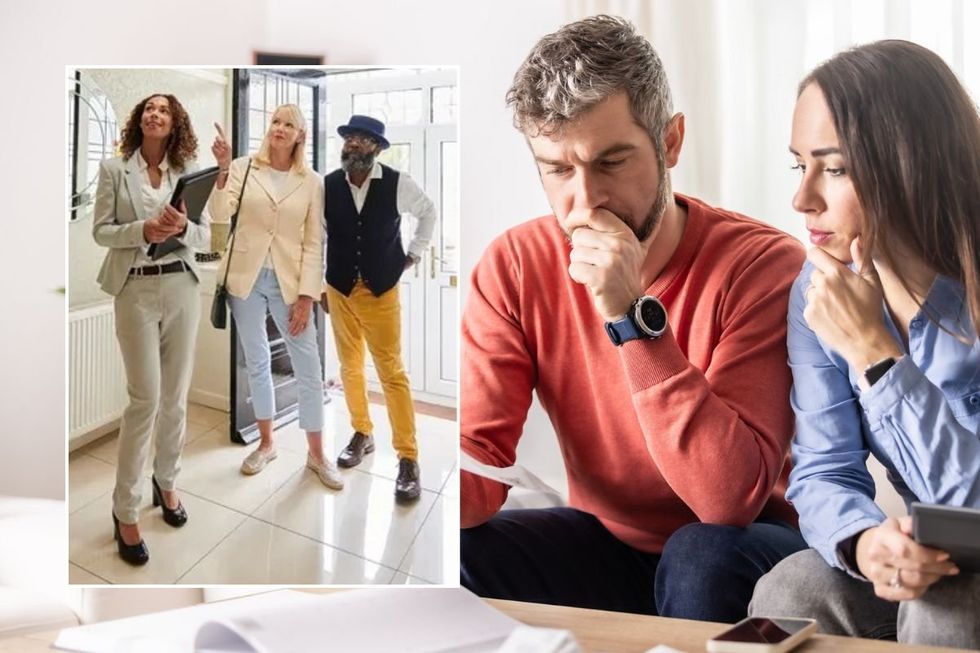 Estate agent showing couple a house / Young couple doing paperwork