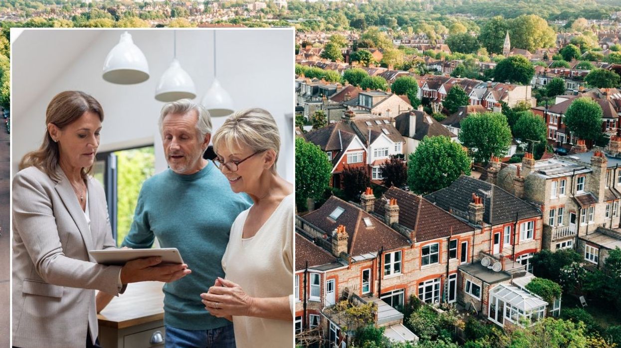 Estate agent with potential buyers / Homes in the UK