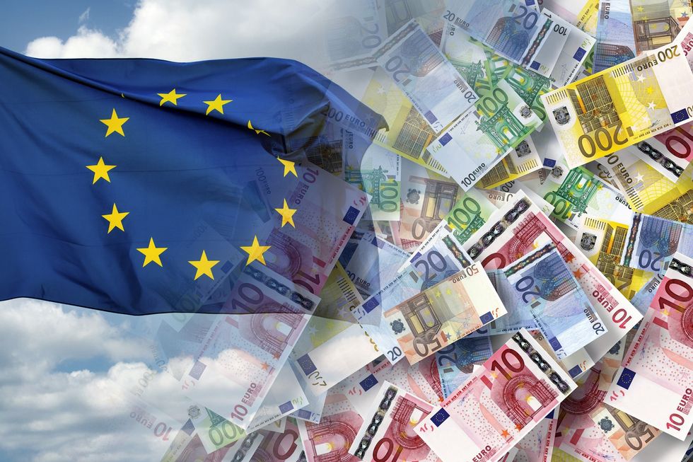EU flag and Euro banknotes