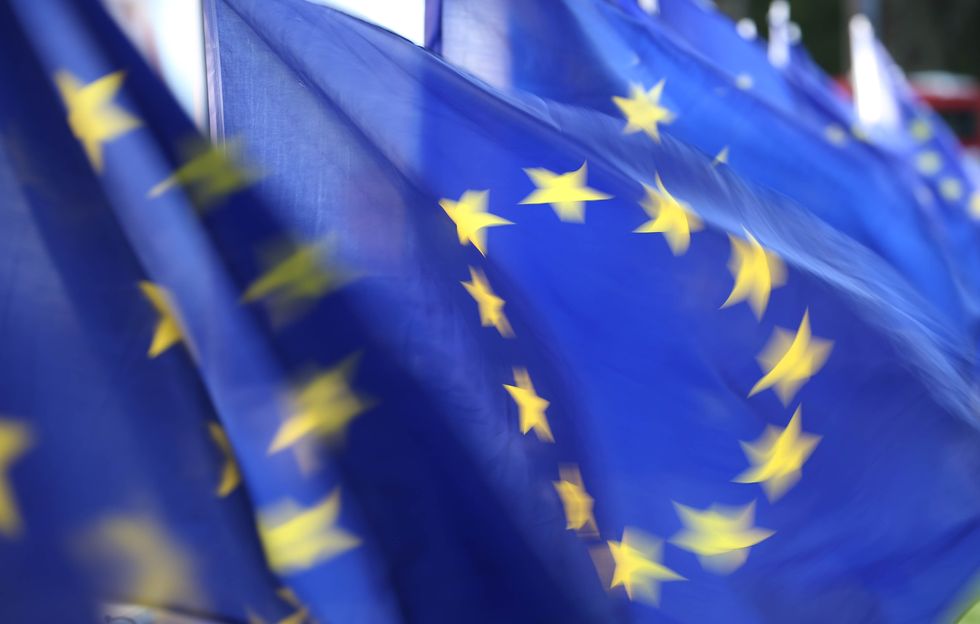 EU flags outside the Houses of Parliament, London.