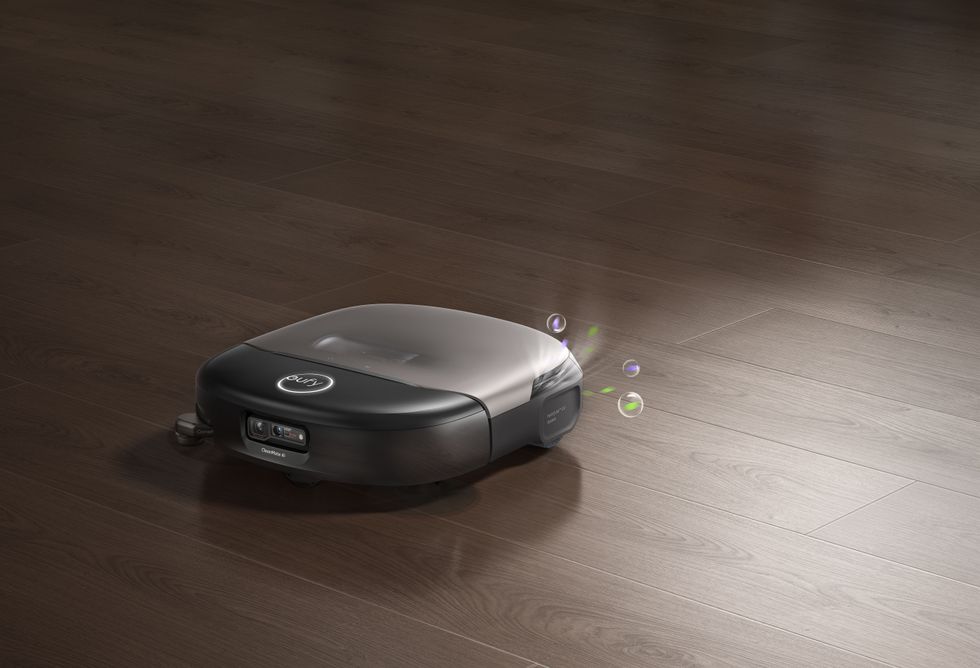 Eufy Omni S2 robot vacuum pictured spraying perfume while it sprays