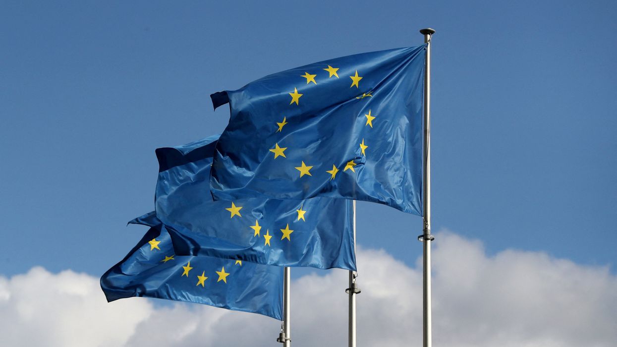 European Union flags fly outside the EU Commission headquarters in Brussels