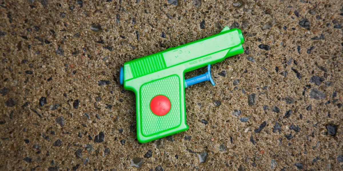 NextImg:Firearms officer who 'rammed' boy off bike CLEARED after mistaking water pistol for real gun