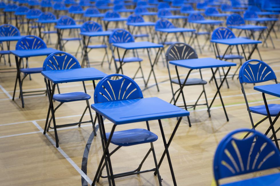 Exam hall with empty chairs