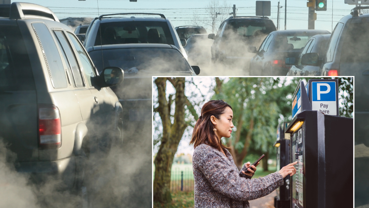 Exhaust emissions and a woman paying for parking
