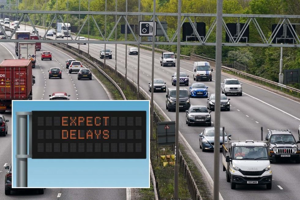 Expect delays road sign and the M6 motorway near Birmingham