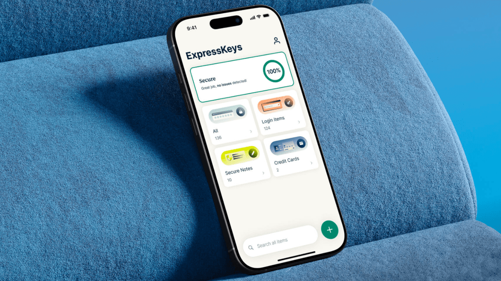 ExpressKeys app pictured on an iPhone resting on a blue sofa