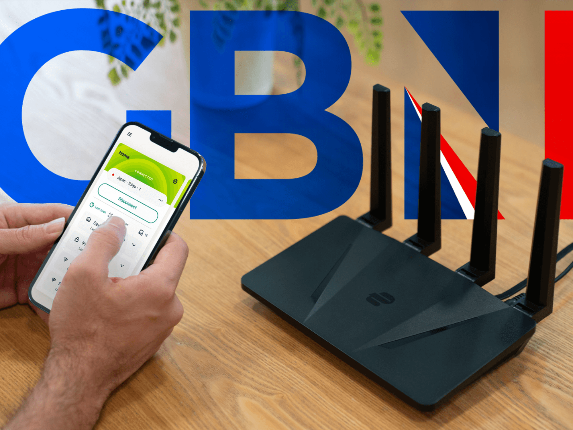 ExpressVPN Wi-Fi router pictured on a desk next to a laptop and iPhone running the app