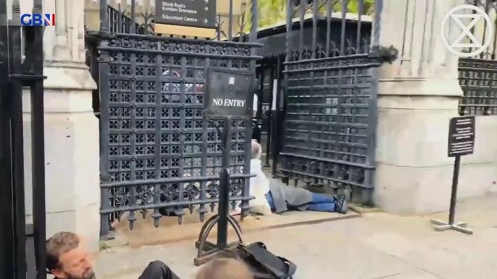 Extinction Rebellion protesters superglue hands to Speaker's chair inside House of Commons
