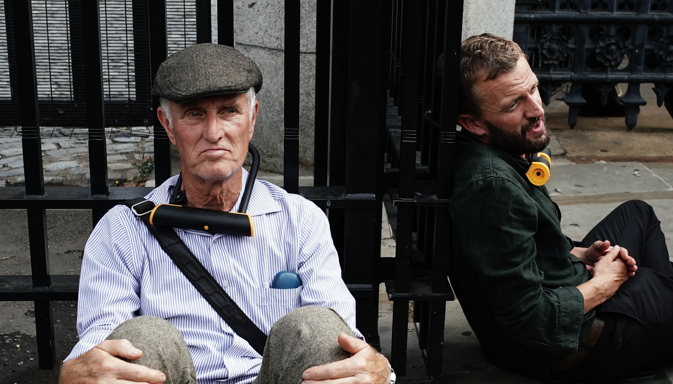 Extinction Rebellion protesters, who have padlocked their necks to the railings, outside the Houses of Parliament, Westminster, calling for a Citizen's assembly.