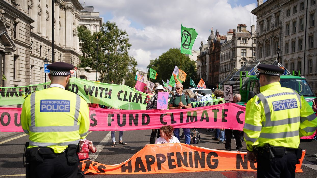 Extinction Rebellion protests congregating outside the offices of HM Revenue and Customs in 2021