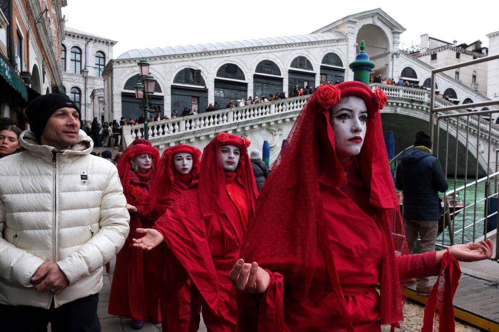 Extinction Rebellion's activists protest next the Rialto Bridge