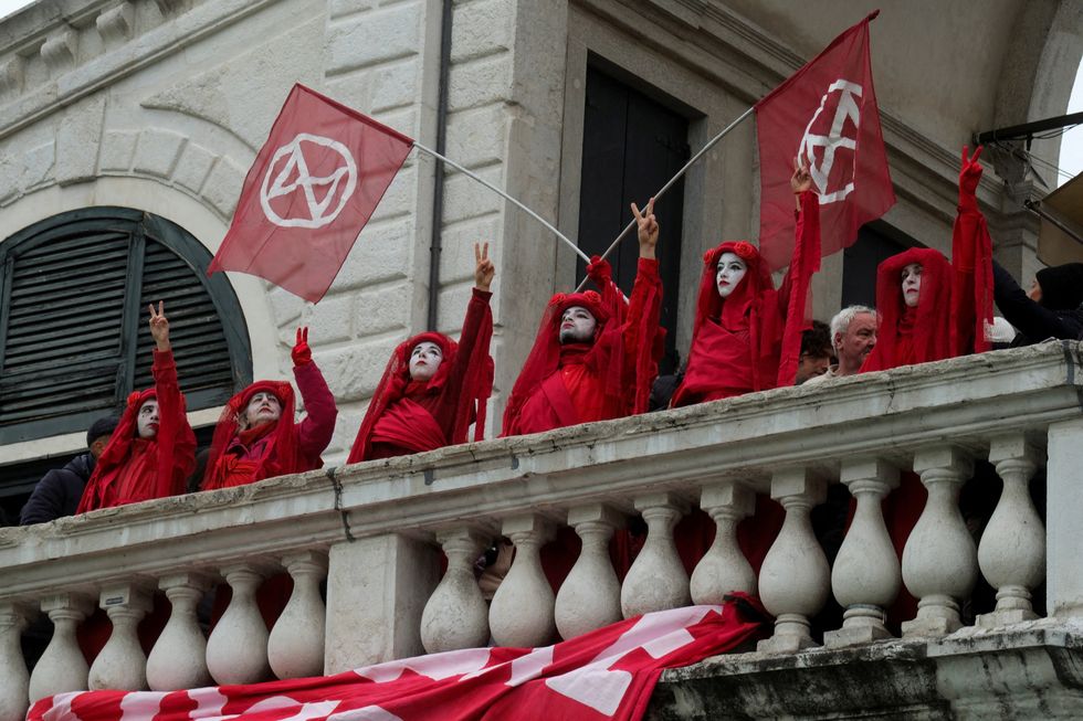 Extinction Rebellion's activists protest on the Rialto Bridge