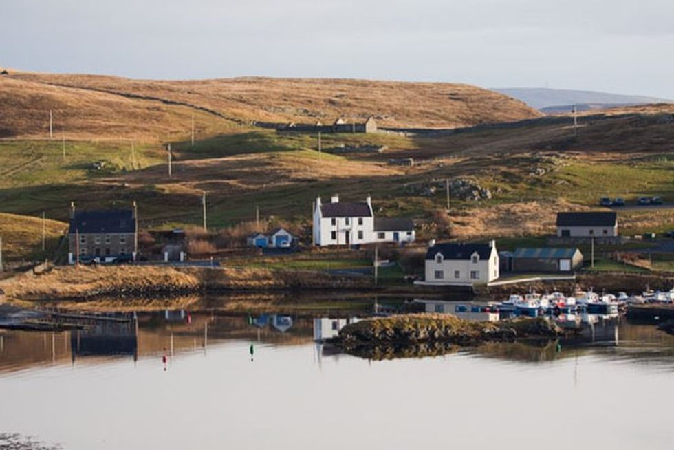 Extra police officers and vehicles from across Scotland have been sent to the Shetland islands after an undersea telecommunications cable was damaged
