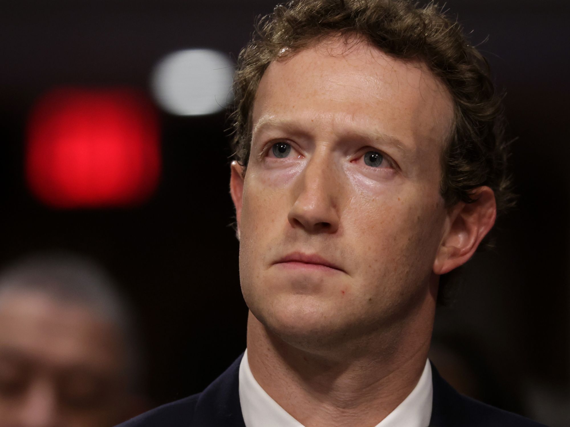 facebook ceo mark zuckerberg looking concerned during congressional hearings in the USA