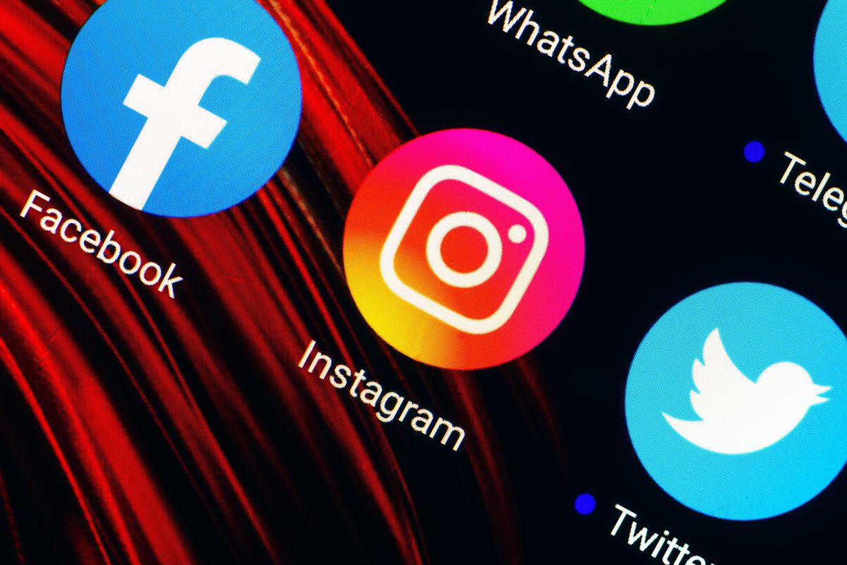 facebook instagram and twitter app icons are pictured on a smartphone screen 