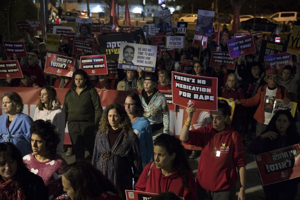 Families of hostages held in Gaza by Hamas and protesters take part in a demonstration outside the Israeli cabinet meeting on February 8, 2024 in Tel Aviv, Israel