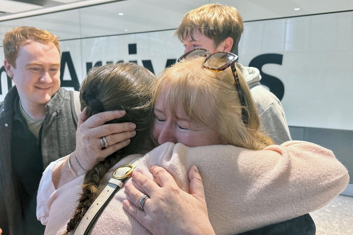 Families reuniting after evacuation flight