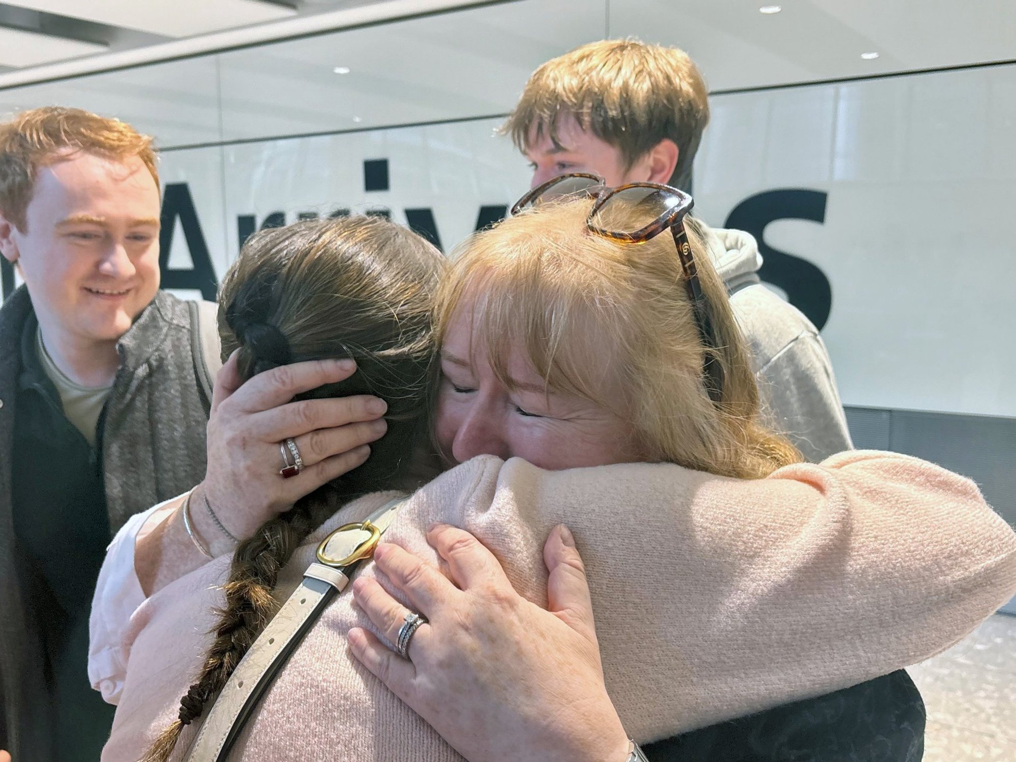 Families reuniting after evacuation flight