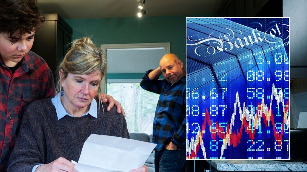 Family looking at bills and Bank of England rate rise