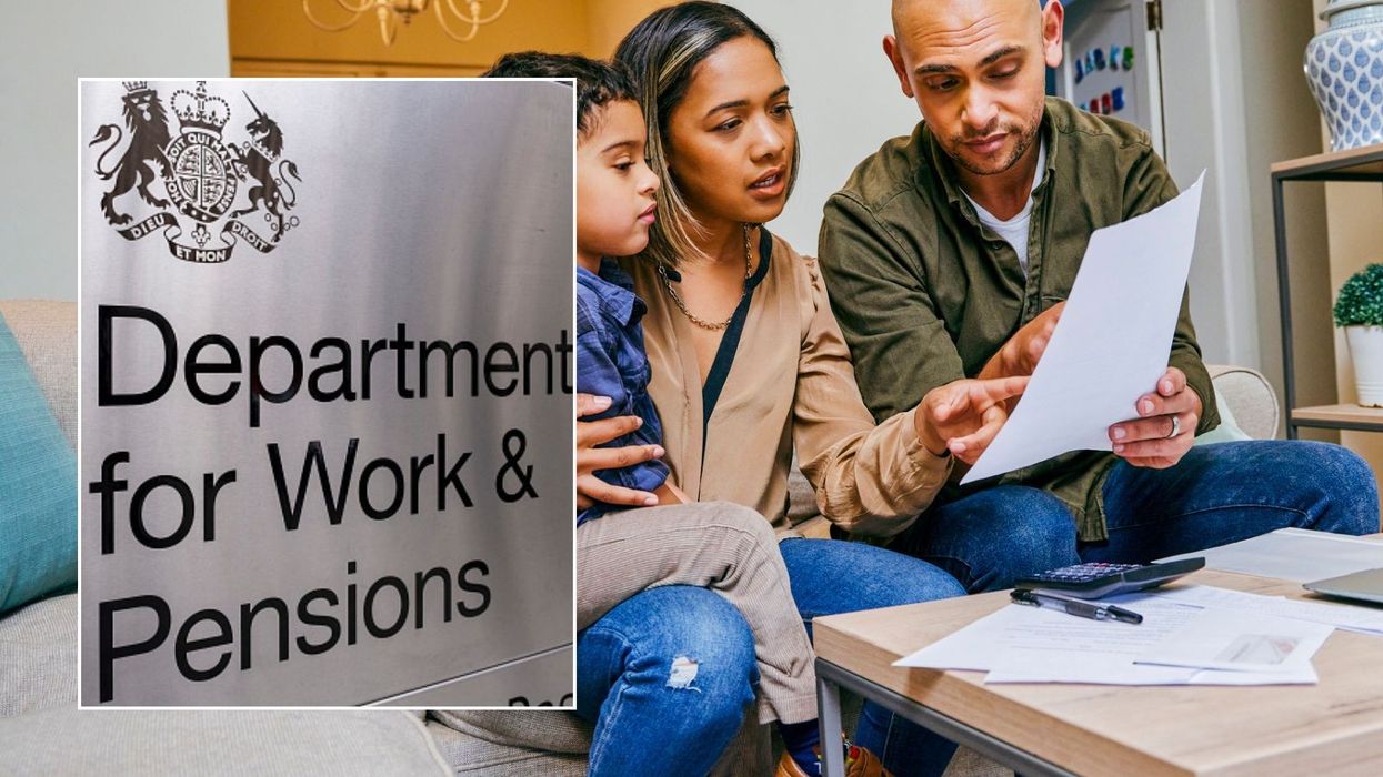 Family looking at letter and DWP sign